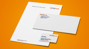 UVA Health stationery on orange background